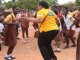 CHAIRMAN OF NCCE, MS. JOSEPHINE NKRUMAH CHANCED UPON PUPILS (GIRLS) OF NEW GBAWE MA BASIC SCHOOL PLAYING THE ‘AMPE’ GAME